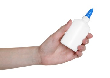 Photo of Woman with bottle of glue on white background, closeup