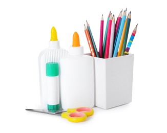 Photo of Different types of glue, pencils and scissors isolated on white