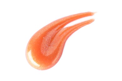 Photo of Sample of orange lipgloss isolated on white, top view