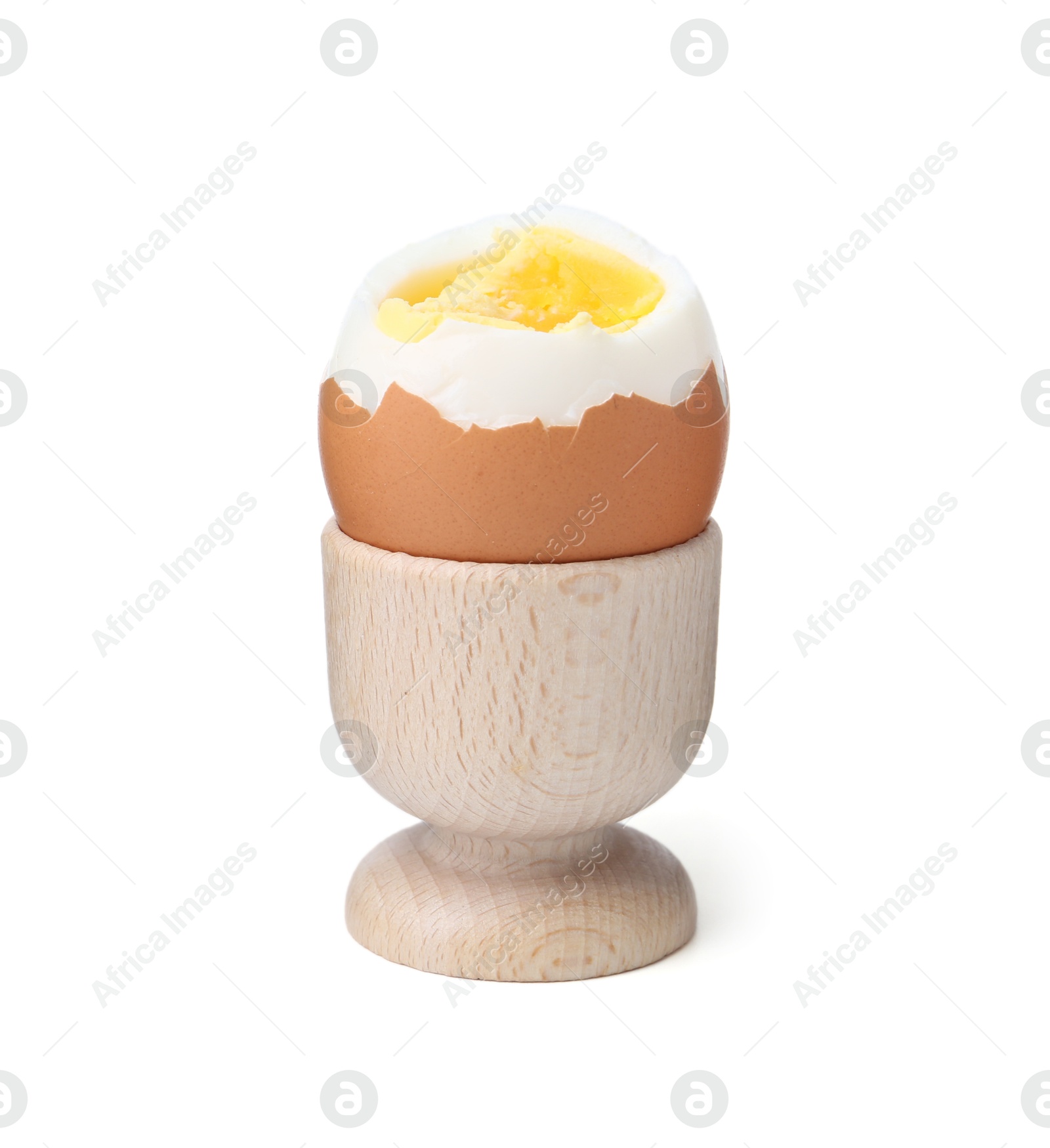 Photo of Soft boiled egg in eggcup isolated on white