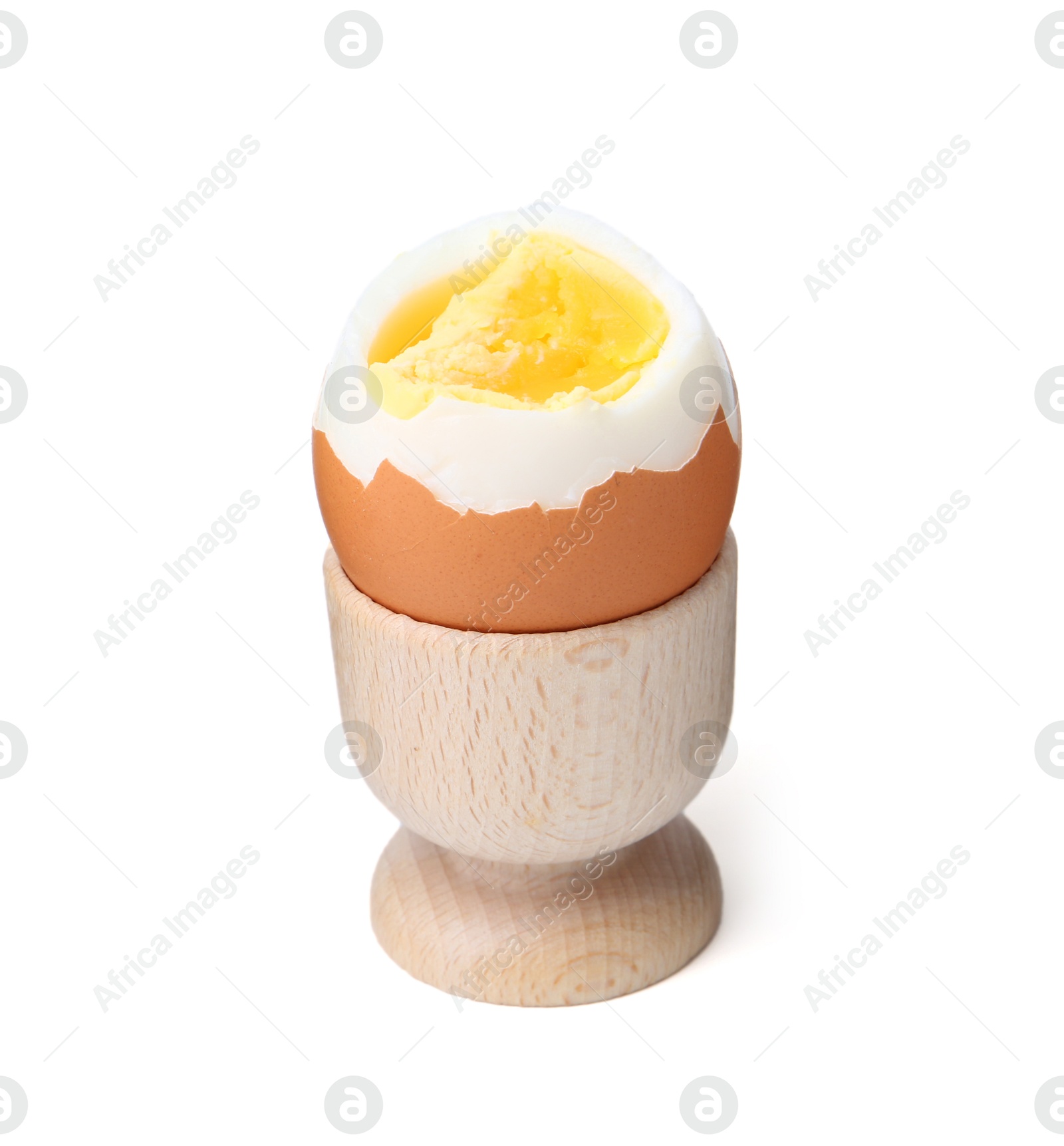 Photo of Soft boiled egg in eggcup isolated on white