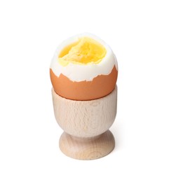 Photo of Soft boiled egg in eggcup isolated on white