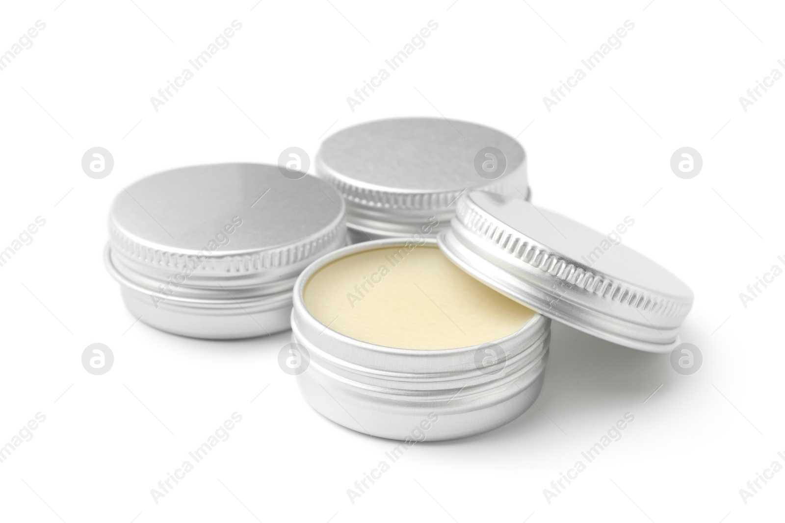 Photo of Lip balms isolated on white. Cosmetic product