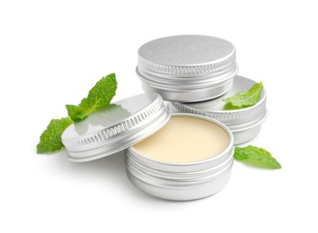 Photo of Mint lip balms and green leaves isolated on white. Cosmetic product