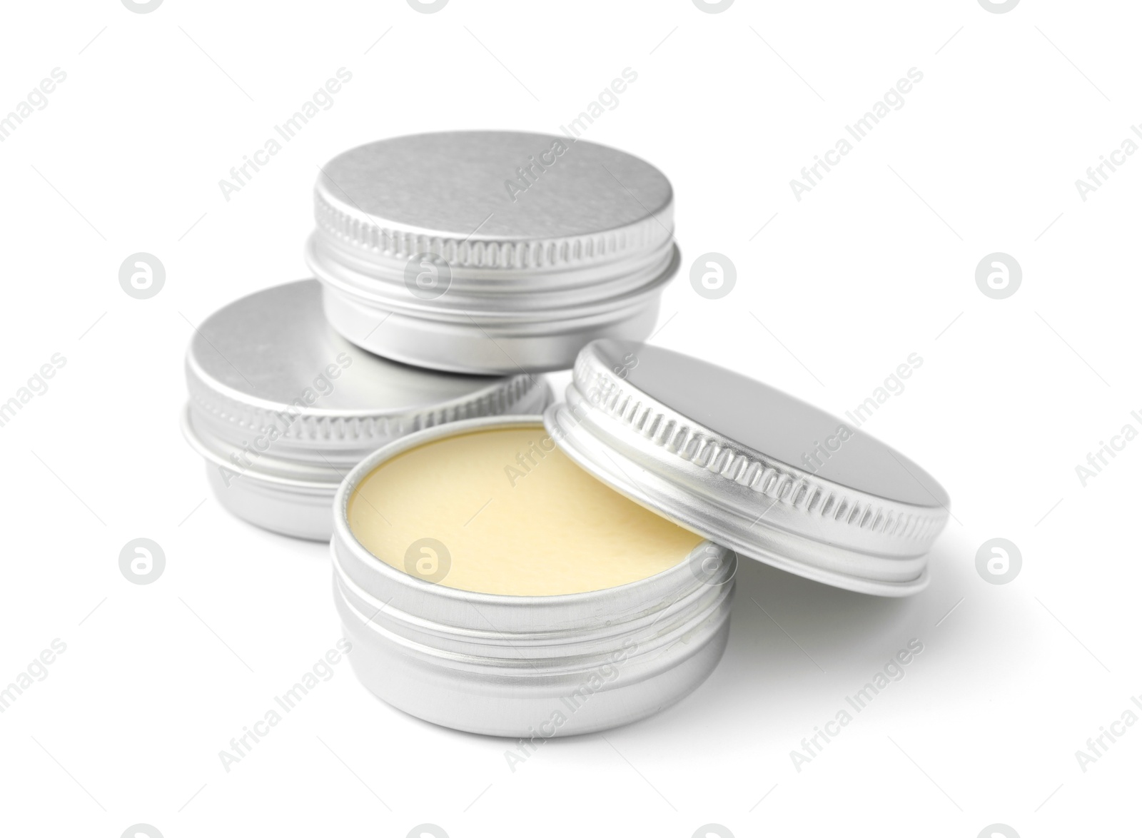 Photo of Lip balms isolated on white. Cosmetic product