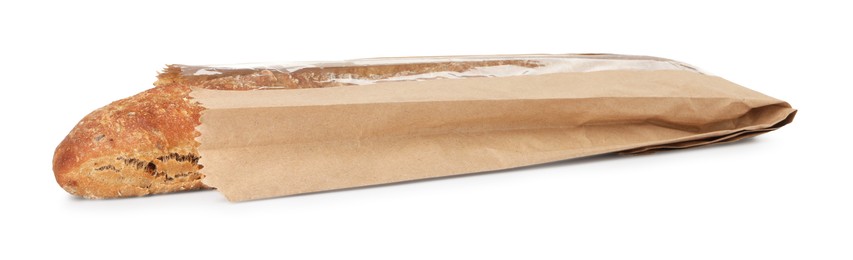 Photo of Fresh baguette in paper bag isolated on white