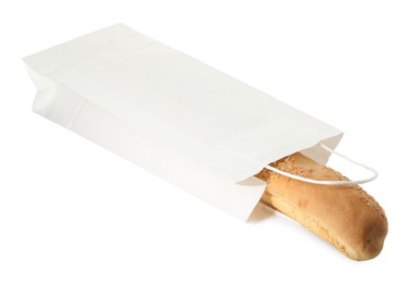 Photo of Fresh baguette with sesame in paper bag isolated on white