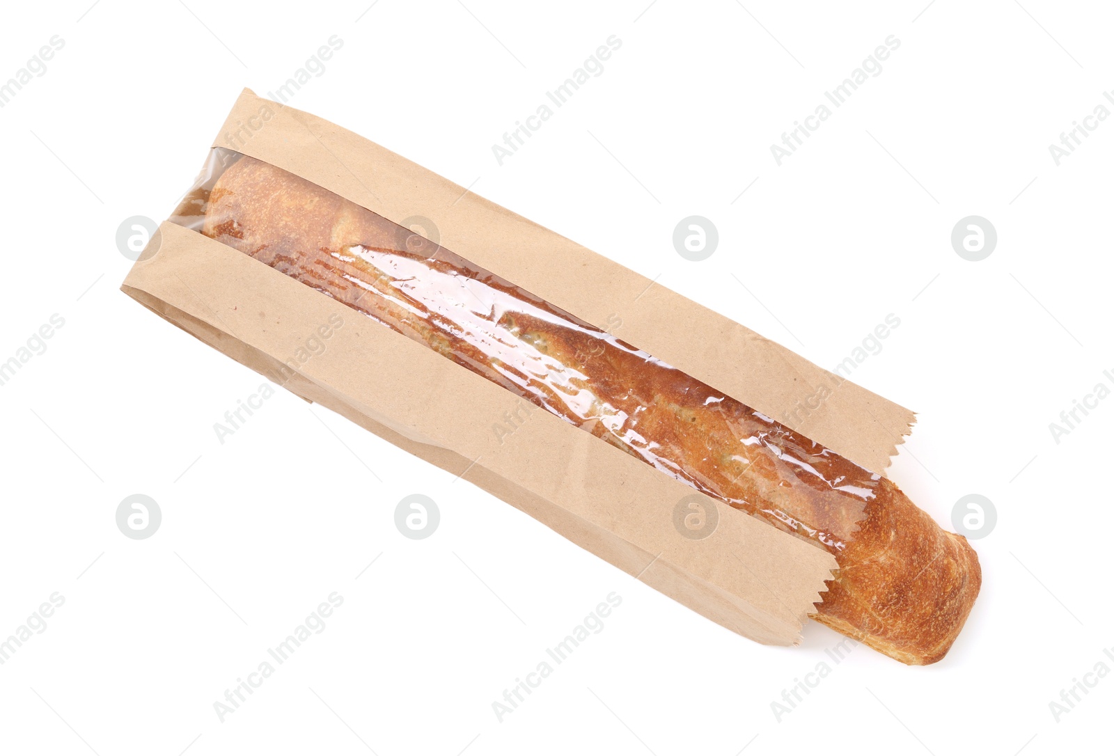 Photo of Fresh baguette in paper bag isolated on white, top view