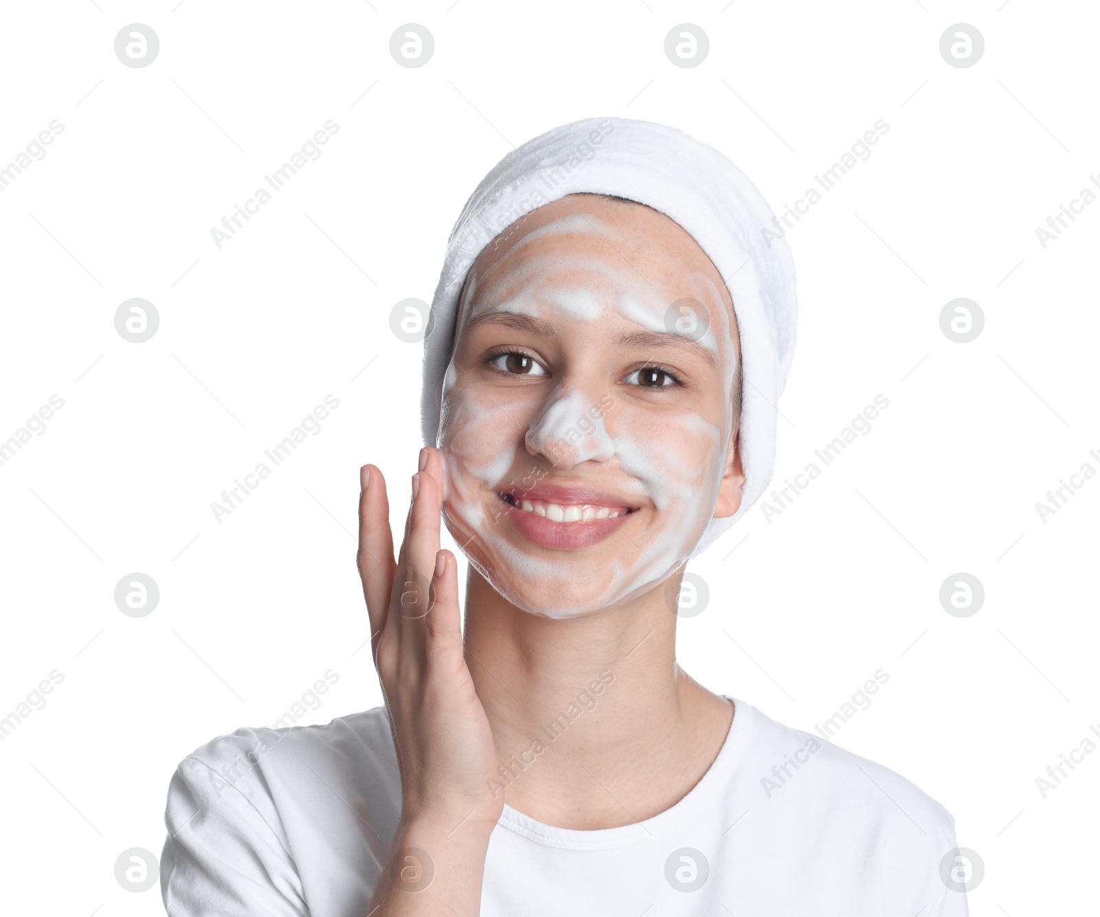 Photo of Teenage girl with cleansing foam on her face against white background. Acne treatment