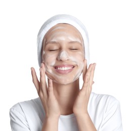 Photo of Teenage girl with cleansing foam on her face against white background. Acne treatment