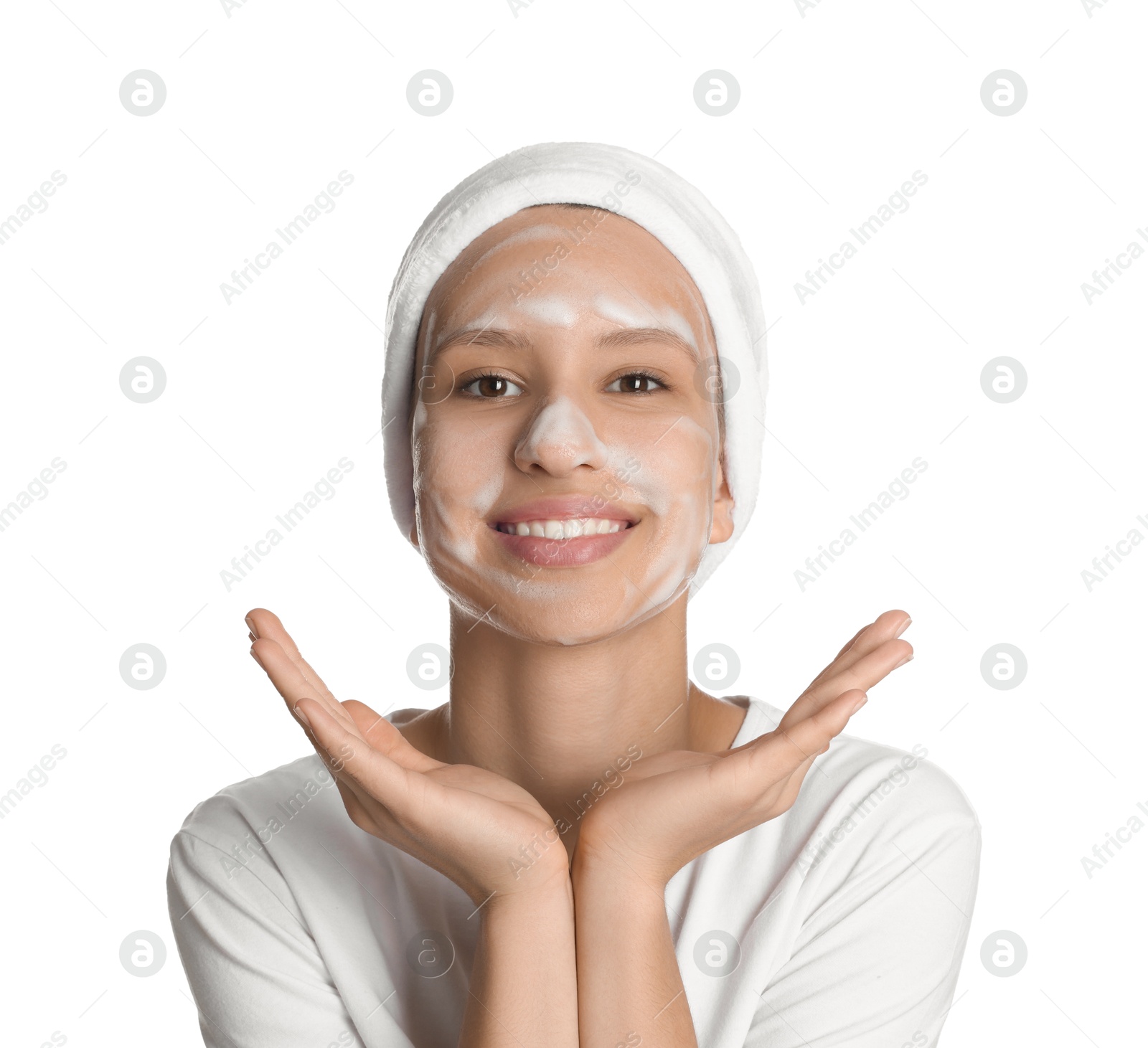 Photo of Teenage girl with cleansing foam on her face against white background. Acne treatment