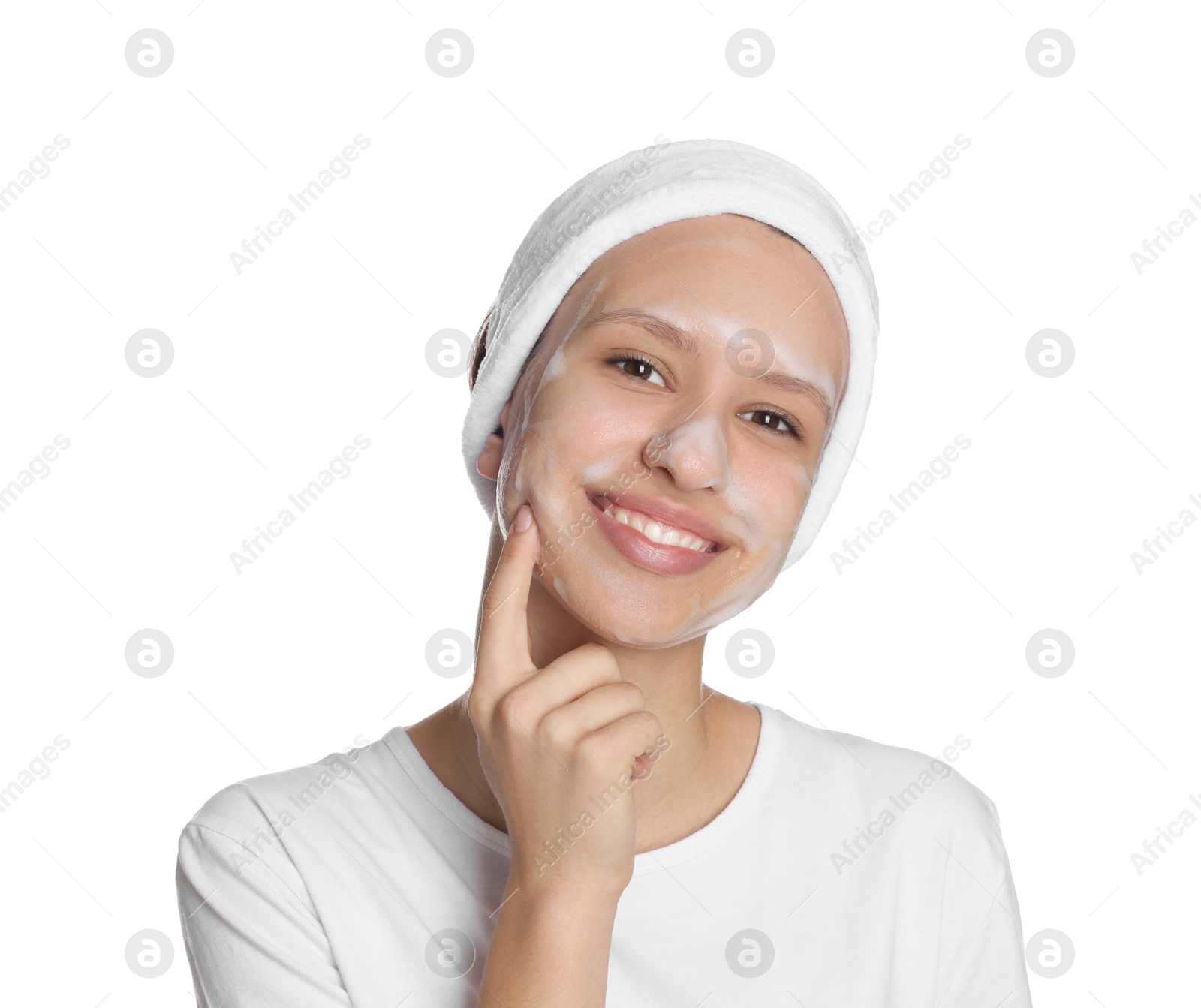 Photo of Teenage girl with cleansing foam on her face against white background. Acne treatment