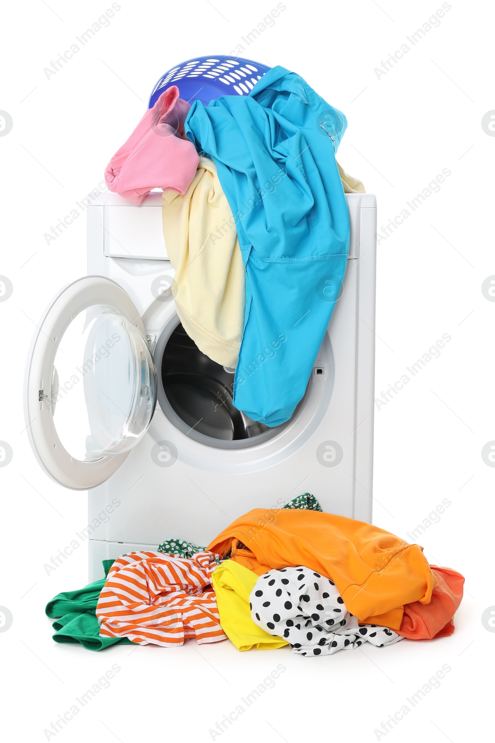 Photo of Washing machine and laundry basket with colorful clothes isolated on white