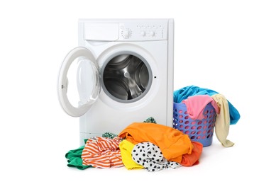 Photo of Washing machine and laundry basket with colorful clothes isolated on white