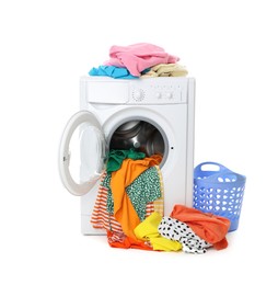 Photo of Washing machine with colorful clothes and laundry basket isolated on white