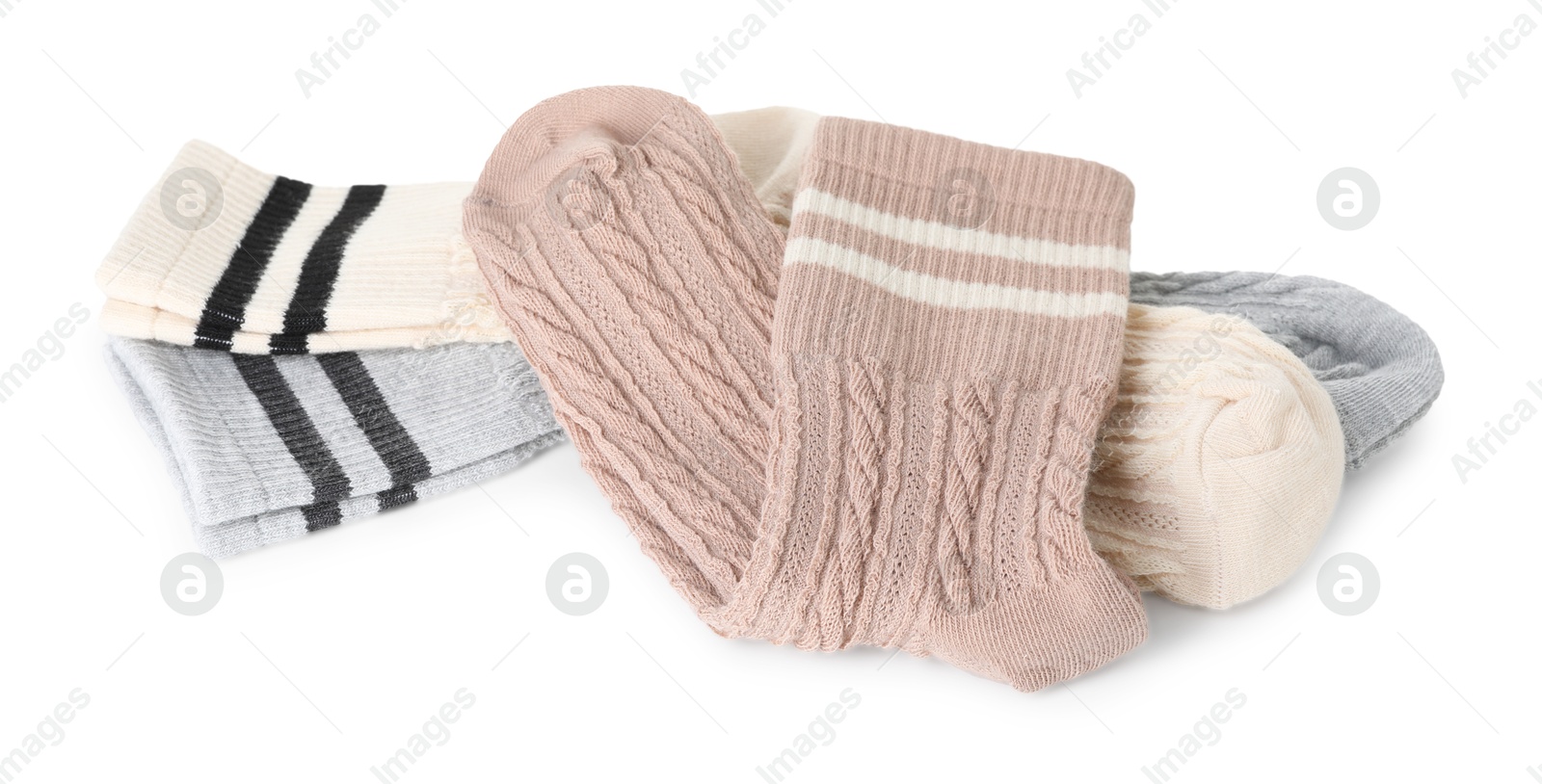 Photo of Different many soft socks isolated on white