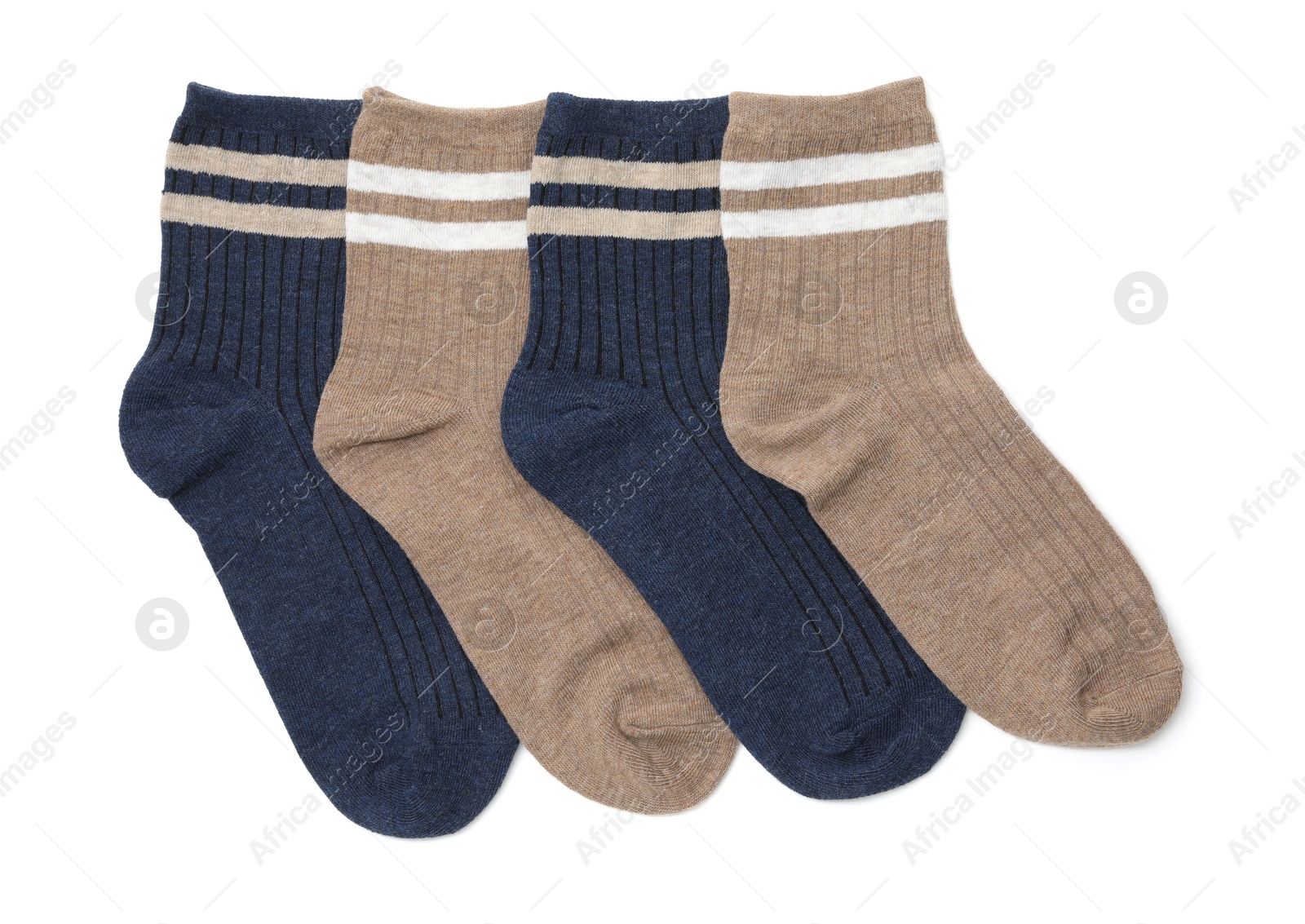 Photo of Different soft socks isolated on white, top view