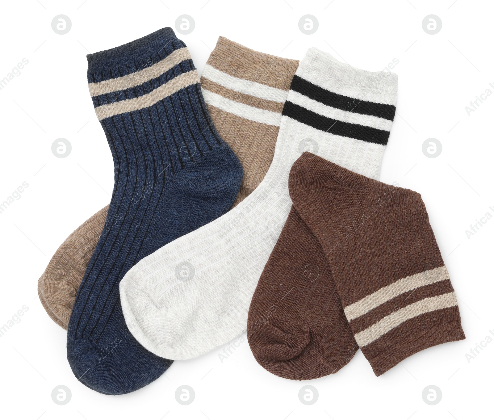 Photo of Different soft socks isolated on white, top view