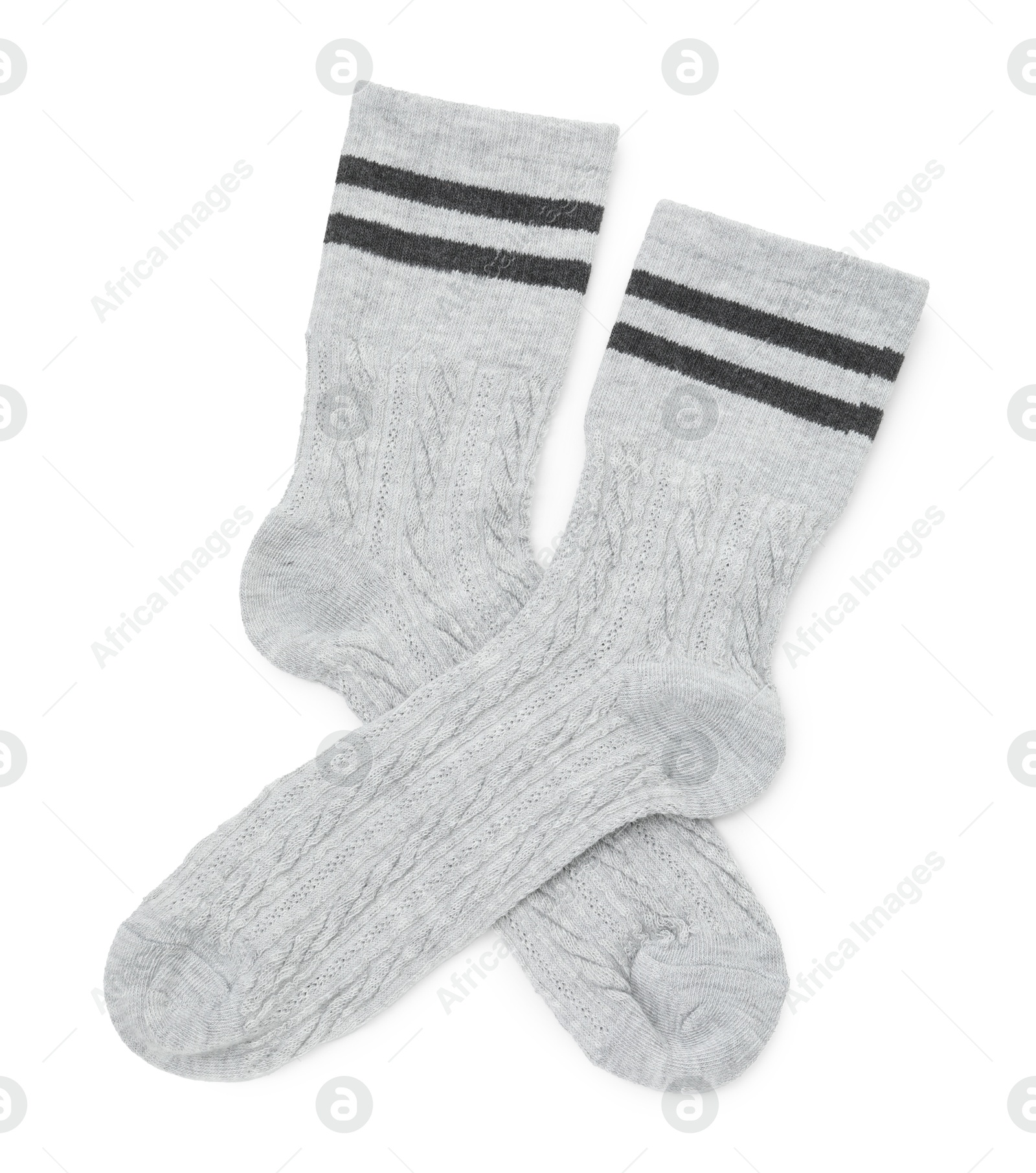 Photo of Pair of soft socks isolated on white, top view