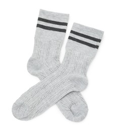 Photo of Pair of soft socks isolated on white, top view