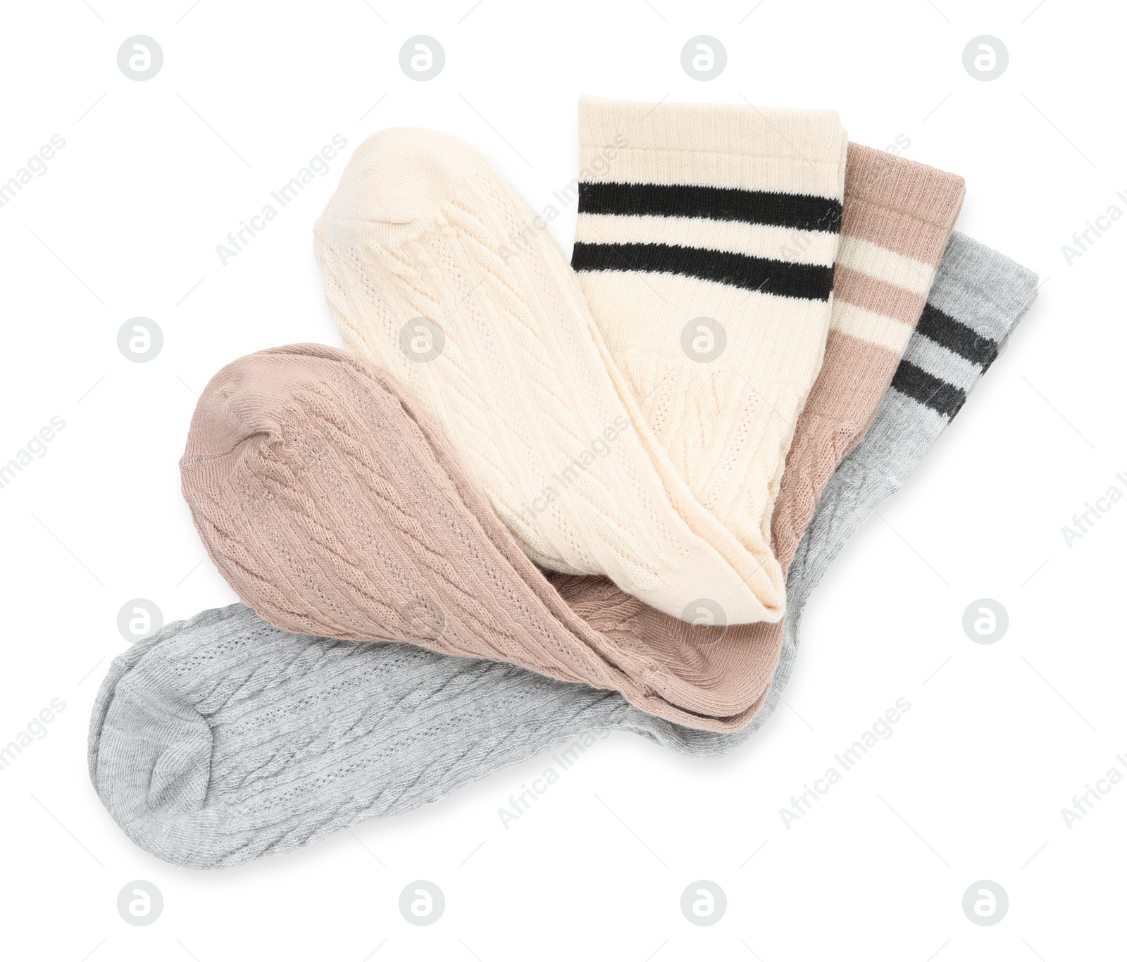 Photo of Different soft socks isolated on white, top view