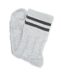 Photo of Pair of soft socks isolated on white, top view