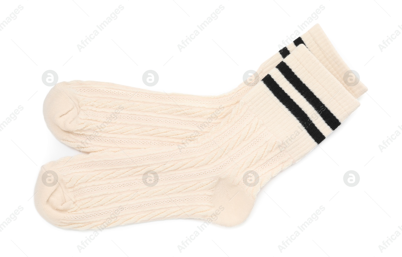 Photo of Pair of soft socks isolated on white, top view