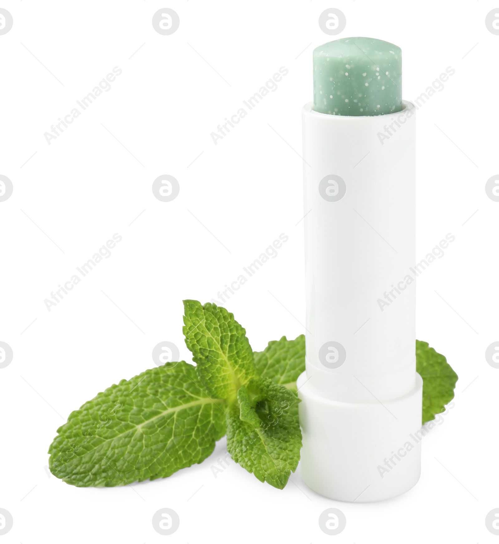 Photo of Mint lip balm and green leaves isolated on white. Cosmetic product