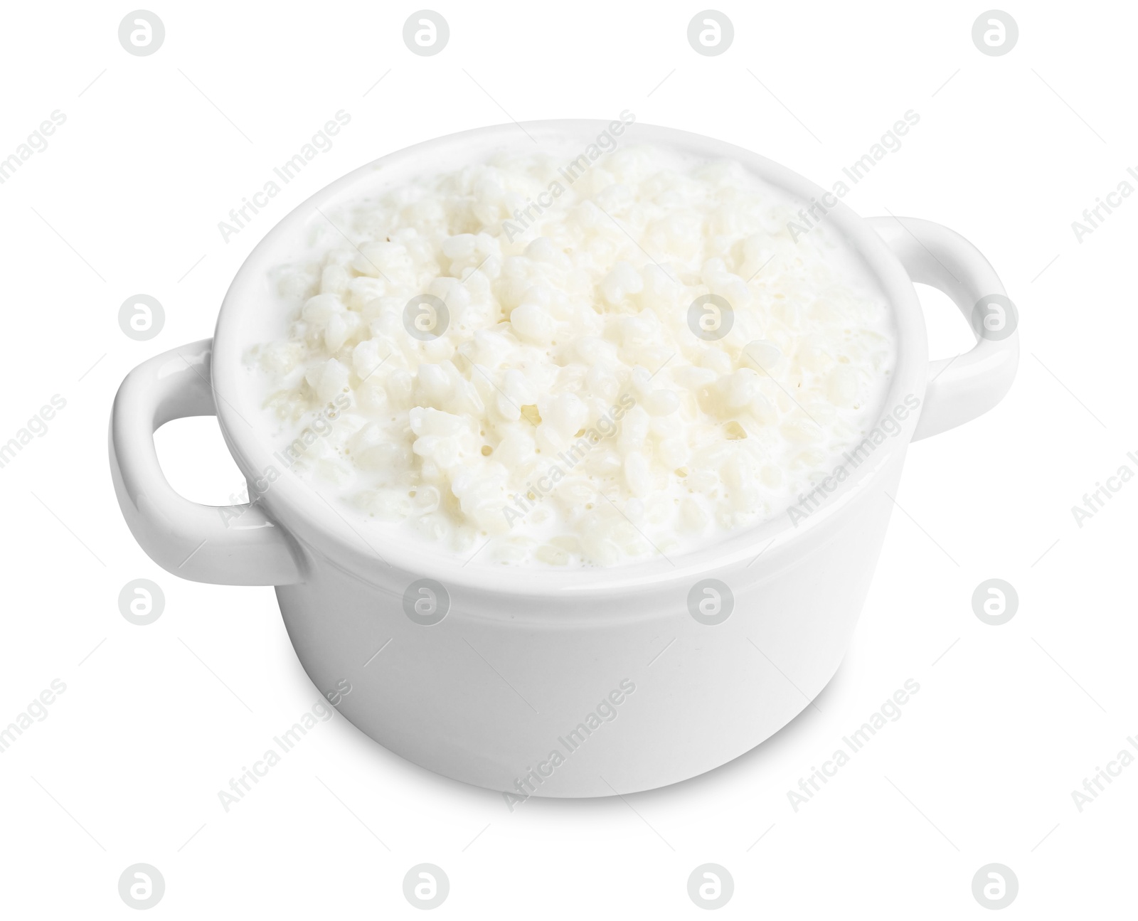 Photo of Delicious rice pudding in ceramic dish isolated on white