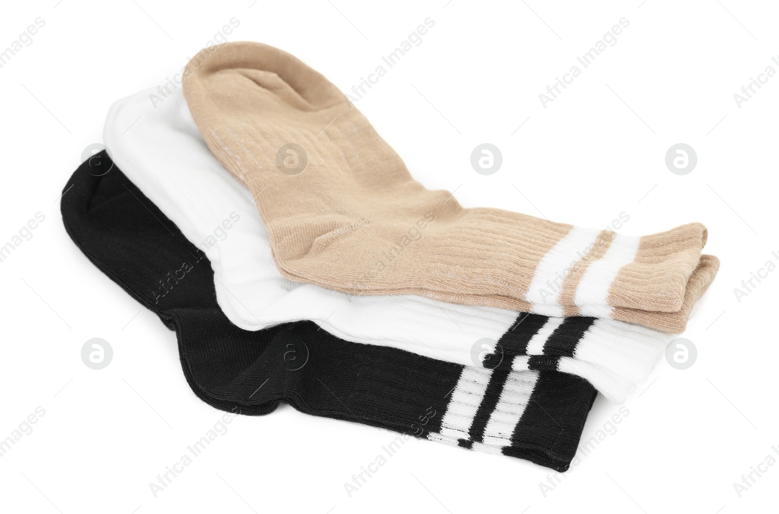 Photo of Pairs of soft socks isolated on white