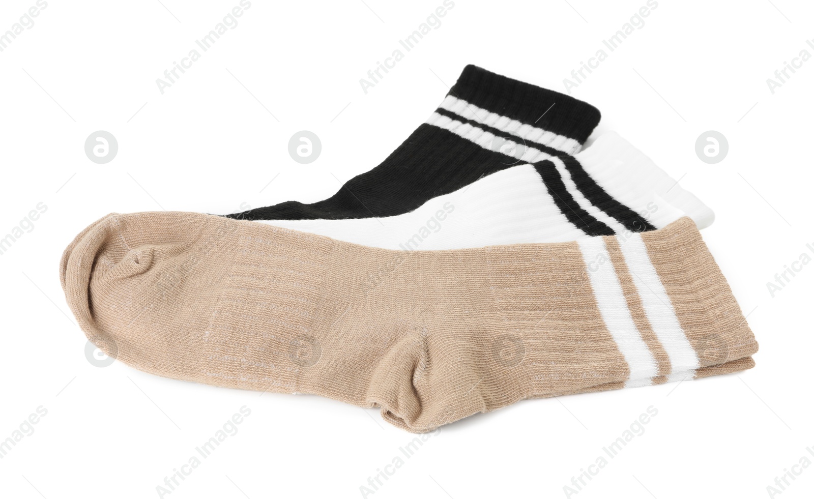 Photo of Pairs of soft socks isolated on white