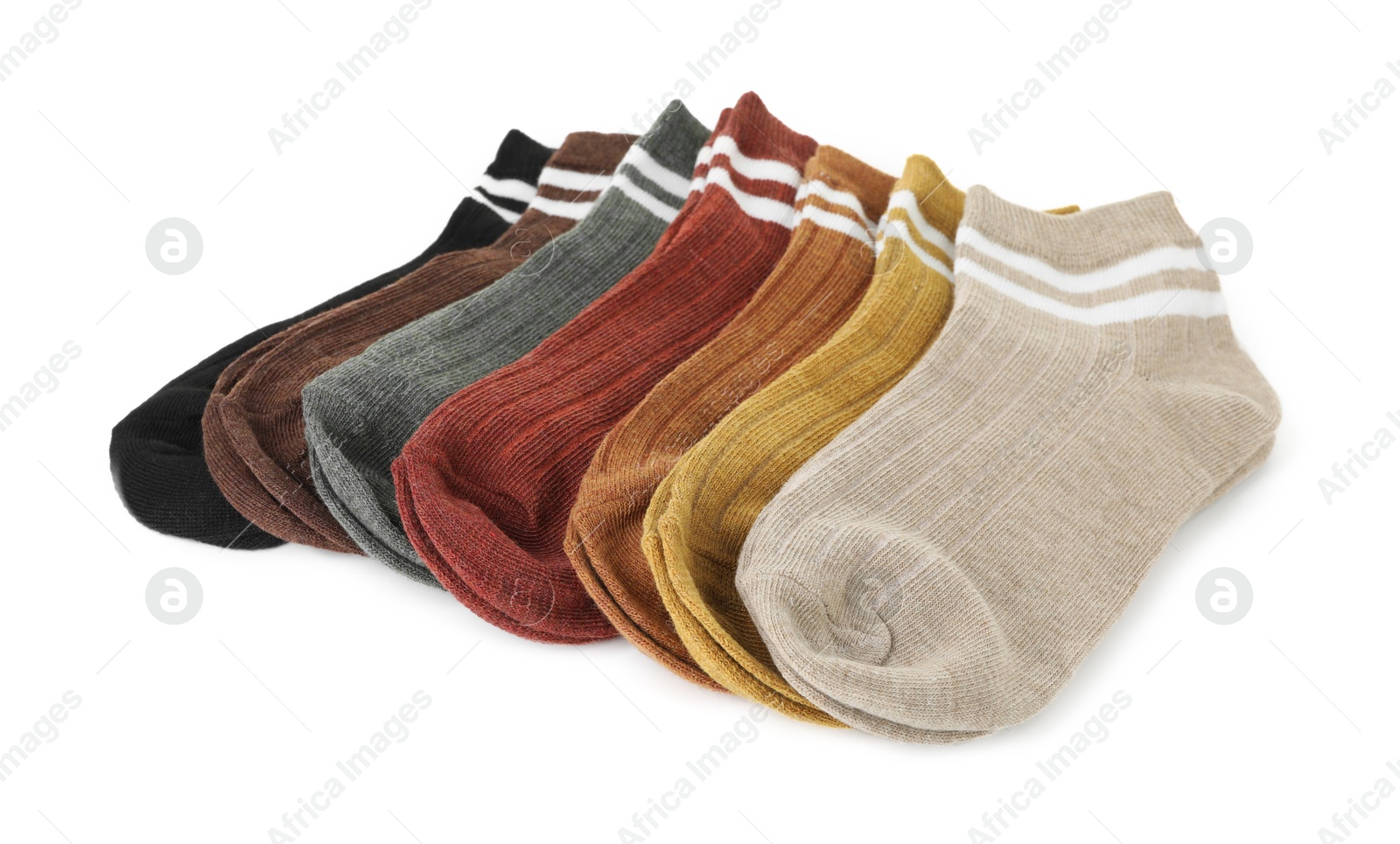 Photo of Pairs of soft socks isolated on white