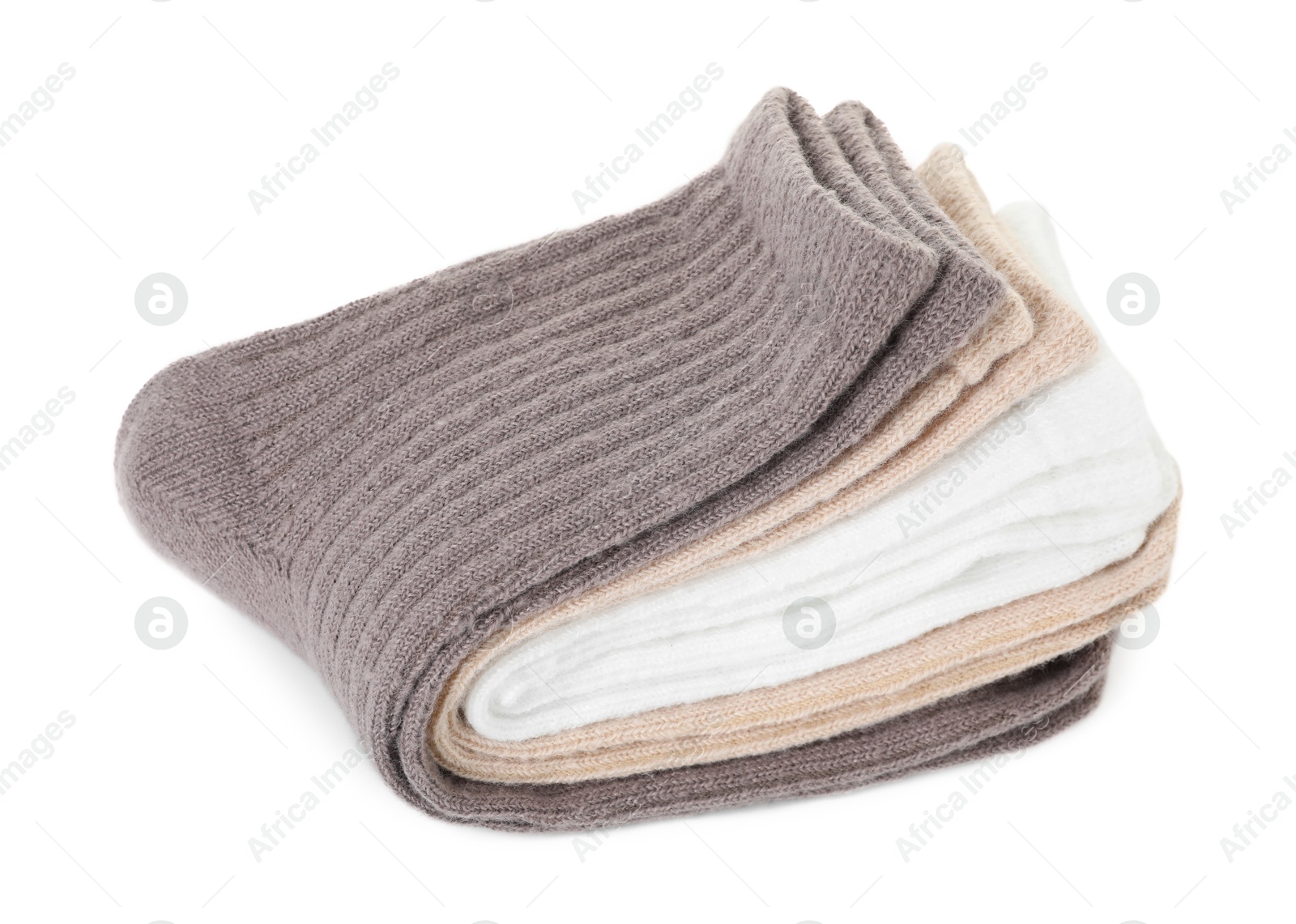 Photo of Pairs of folded soft socks isolated on white