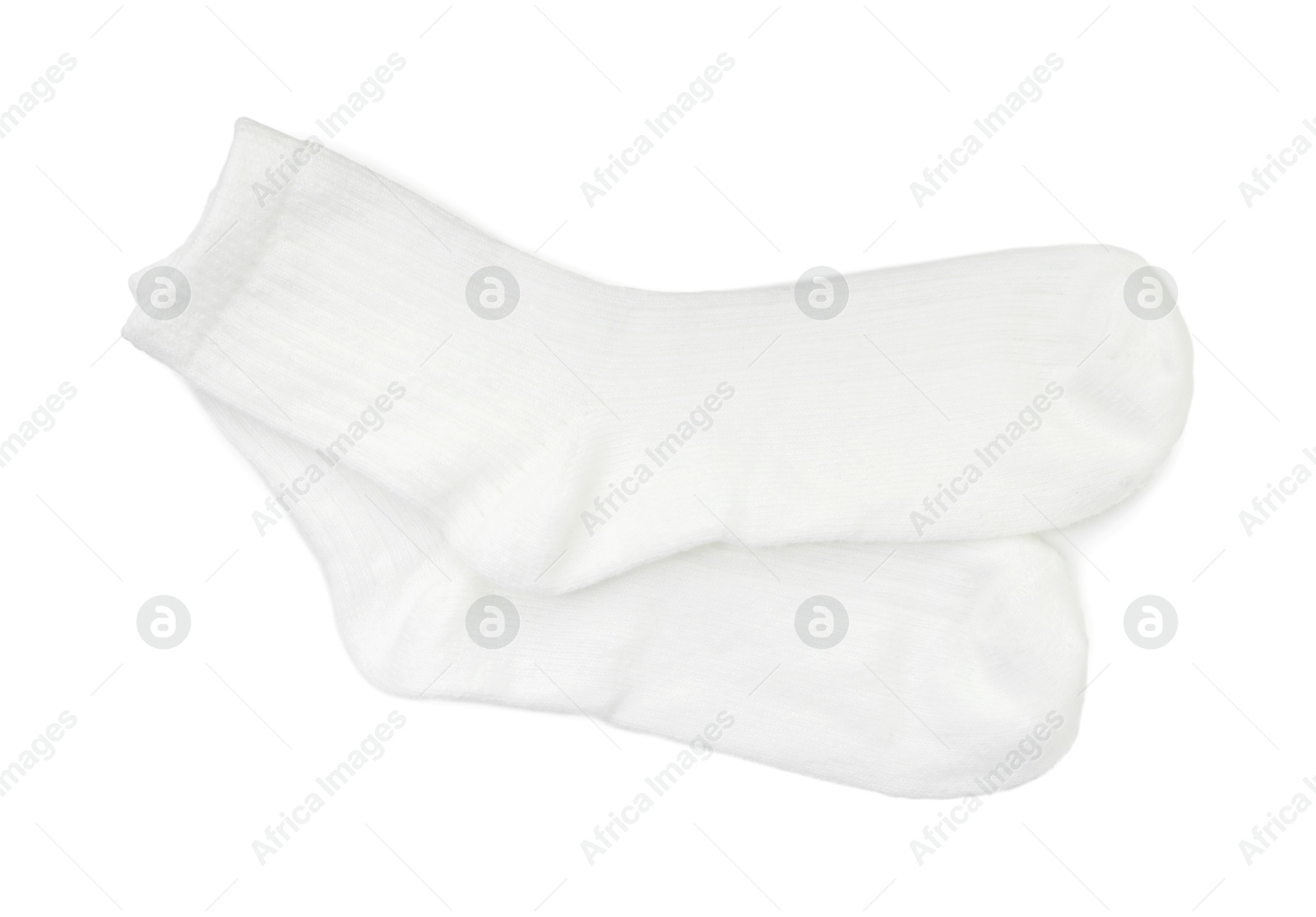 Photo of Pair of soft socks isolated on white, top view