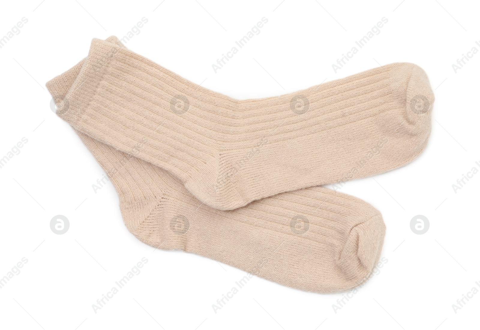 Photo of Pair of soft socks isolated on white, top view