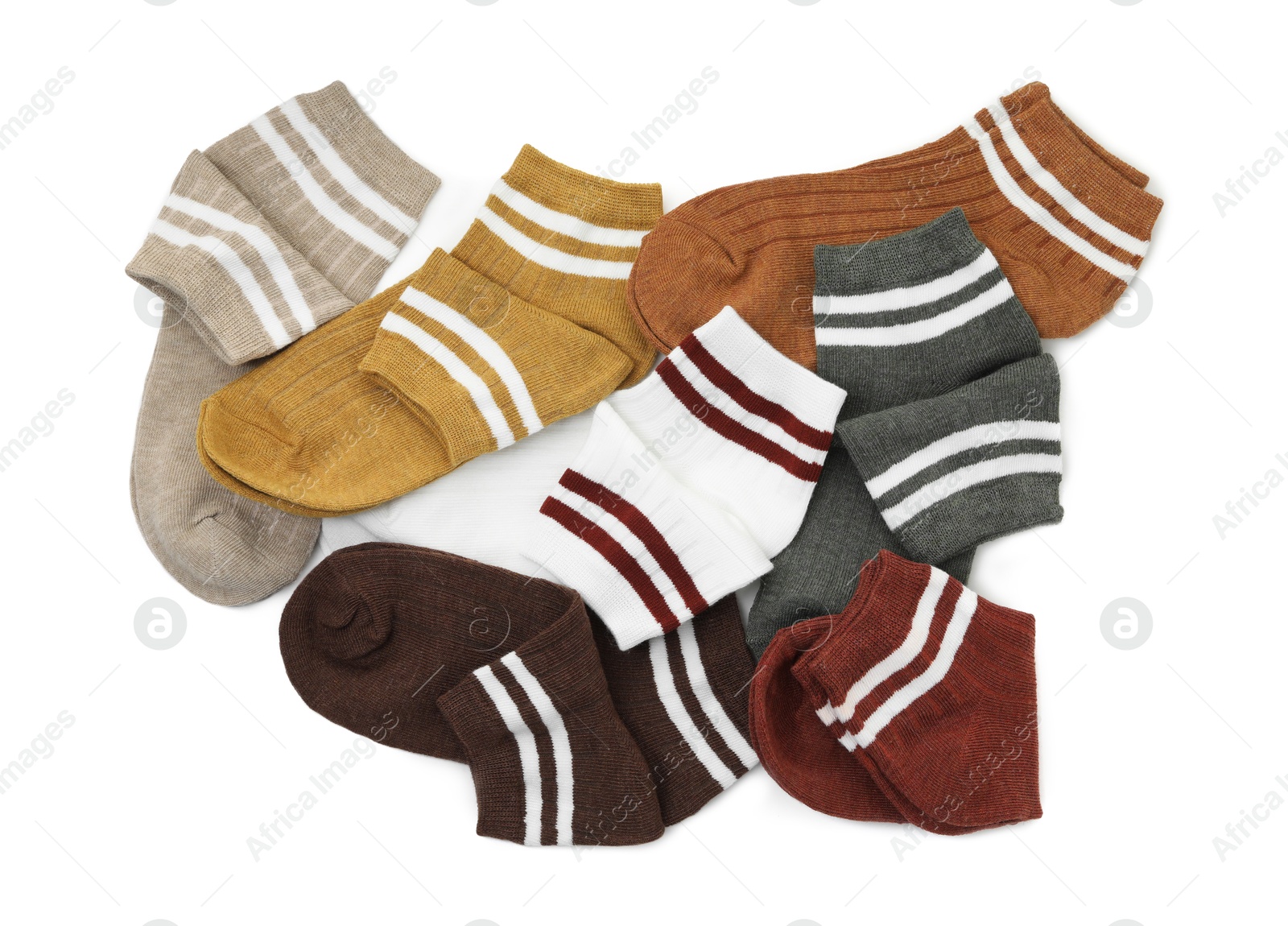 Photo of Pairs of soft socks isolated on white, top view