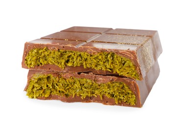 Photo of Pieces of tasty Dubai chocolate with pistachios and knafeh isolated on white