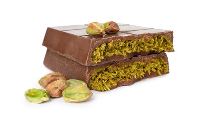 Pieces of tasty Dubai chocolate with pistachios and knafeh isolated on white