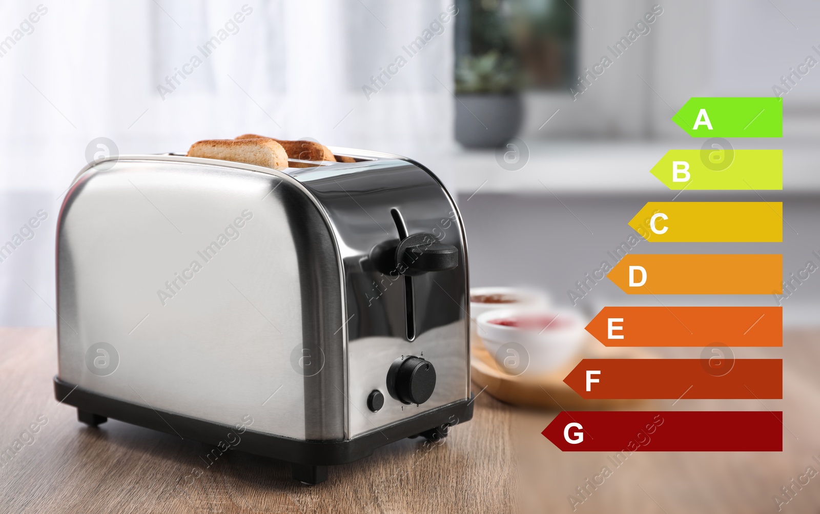 Image of Energy efficiency rating of home appliances. Toaster on wooden table in kitchen