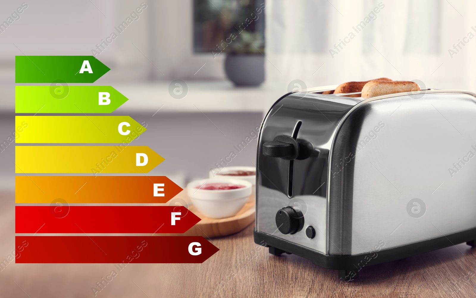 Image of Energy efficiency rating of home appliances. Toaster on wooden table in kitchen