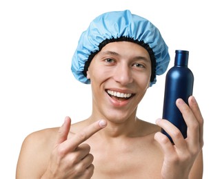 Photo of Happy man in blue shower cap with shampoo on white background