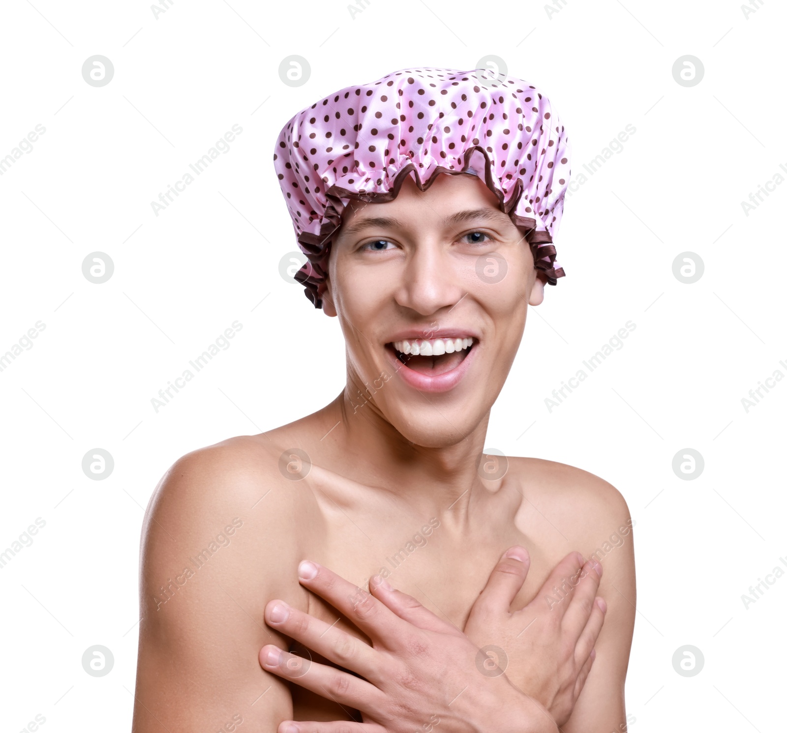 Photo of Happy man in pink shower cap on white background