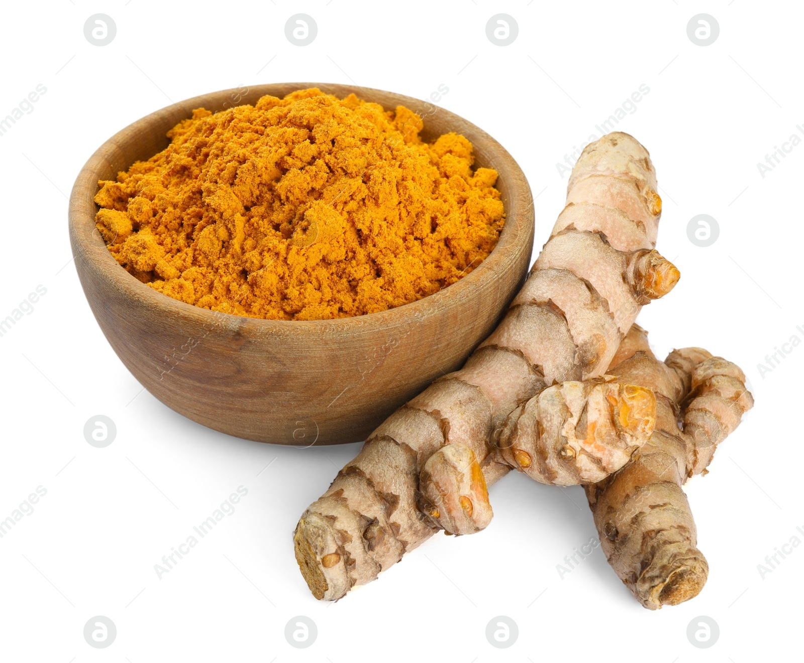 Photo of Bowl of aromatic turmeric powder and raw roots isolated on white