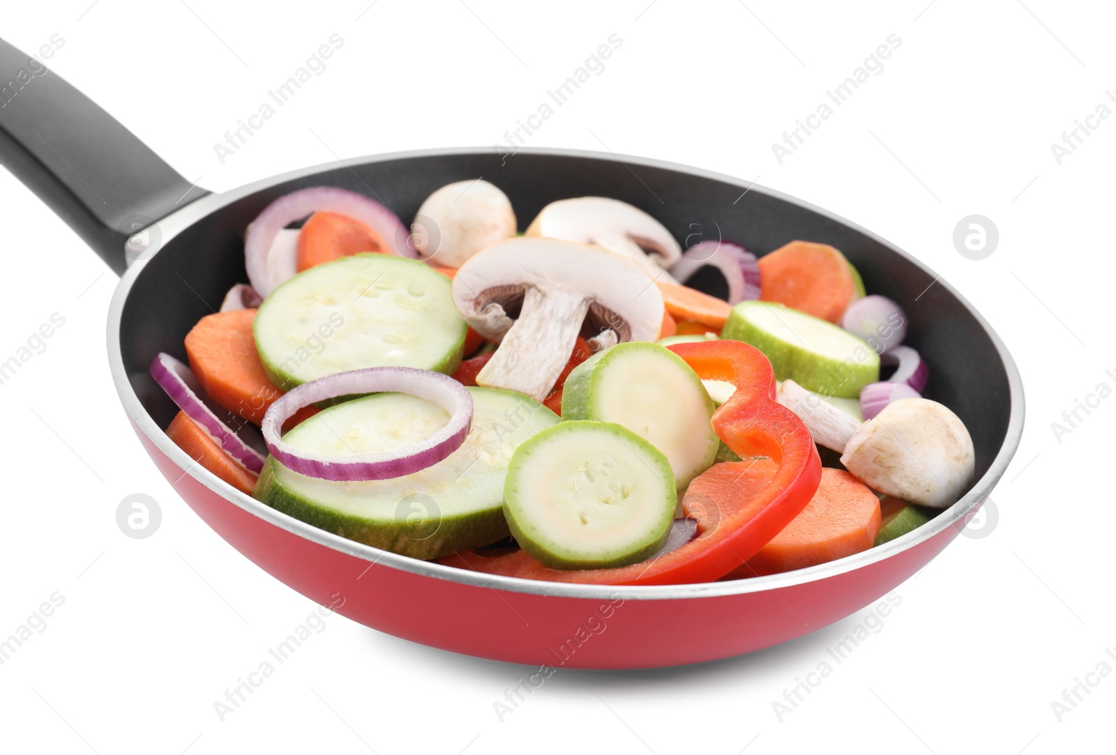 Photo of Frying pan with mix of fresh vegetables and mushrooms isolated on white