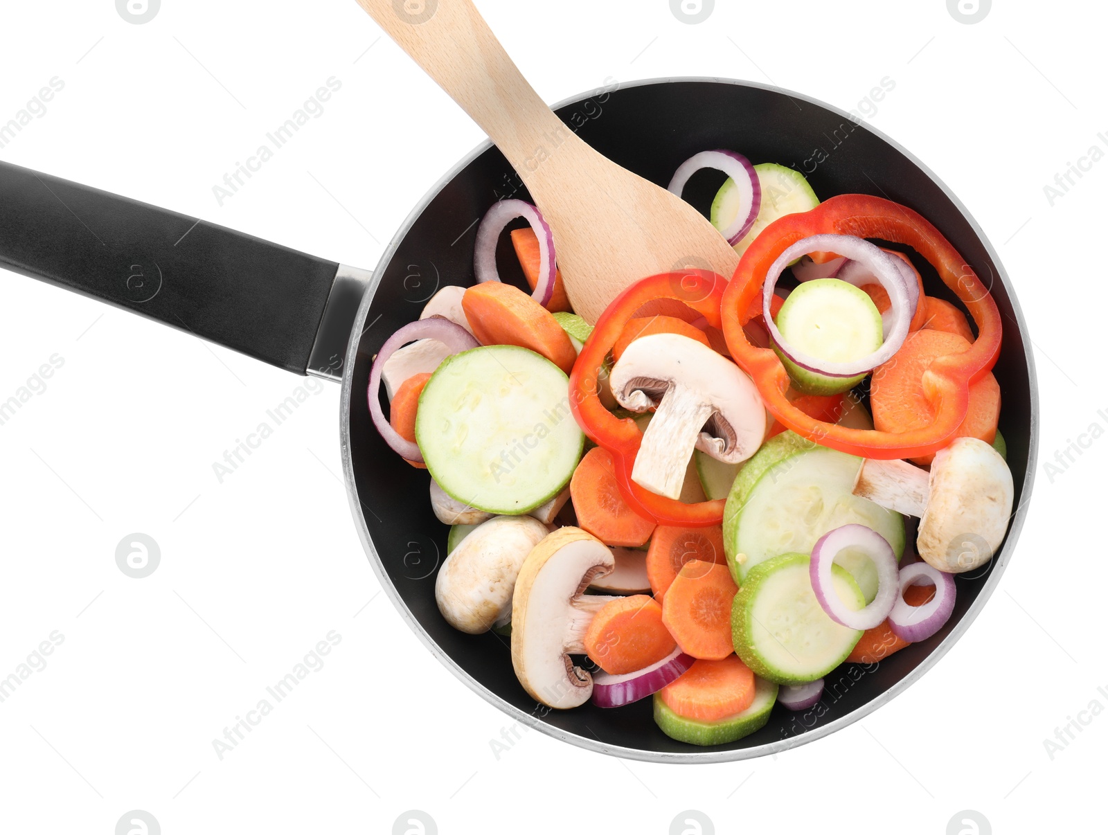 Photo of Frying pan with mix of fresh vegetables, mushrooms and spatula isolated on white, top view