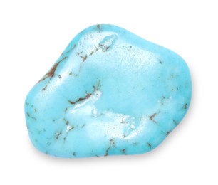 Photo of Beautiful turquoise isolated on white. Natural gemstone