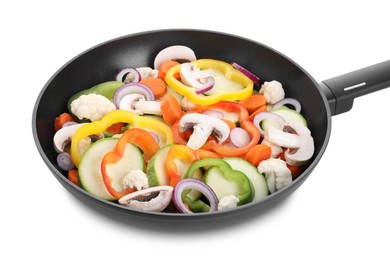 Photo of Frying pan with mix of vegetables and mushrooms isolated on white