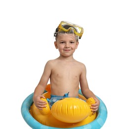 Cute little boy in beachwear with mask and inflatable ring on white background