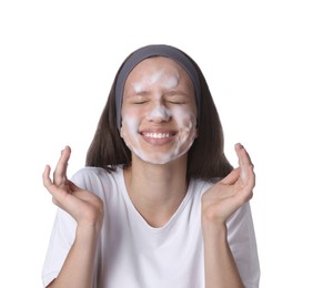 Photo of Teenage girl washing her face with cleanser on white background. Cosmetic product