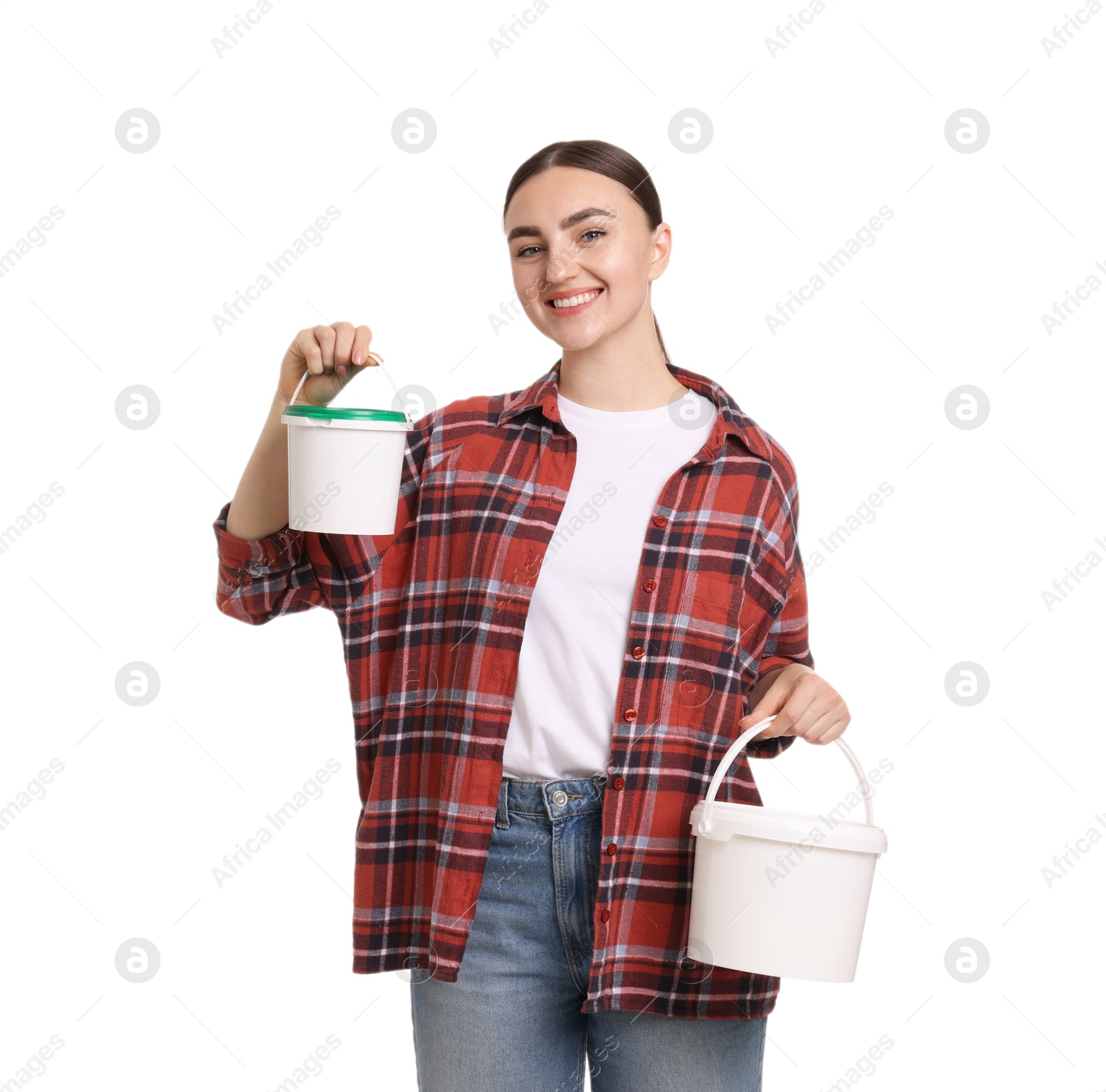 Photo of Portrait of young decorator with paint roller and bucket on white background